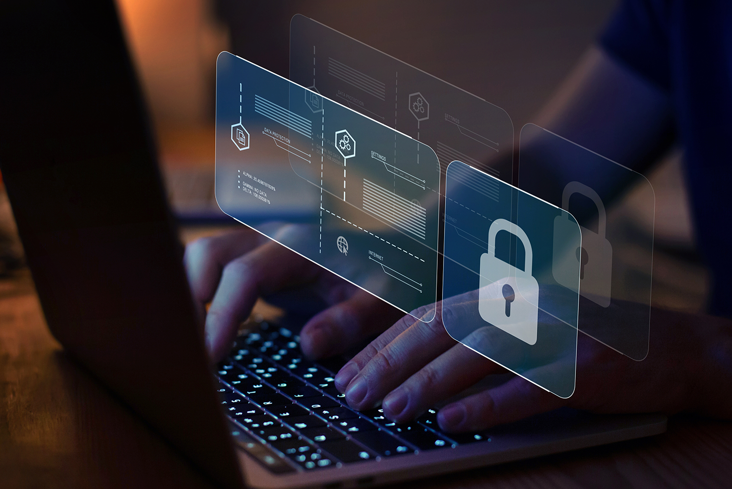 Person typing with lock and data protection icons on screen, symbolizing cybersecurity