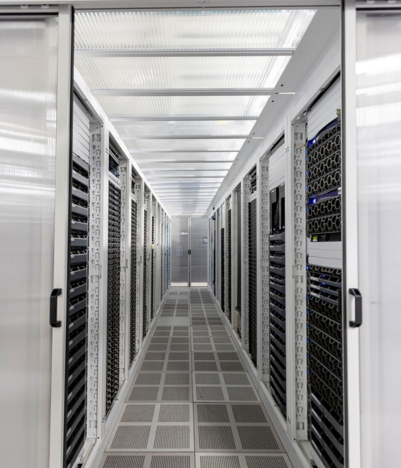 The image shows the interior of a data center.