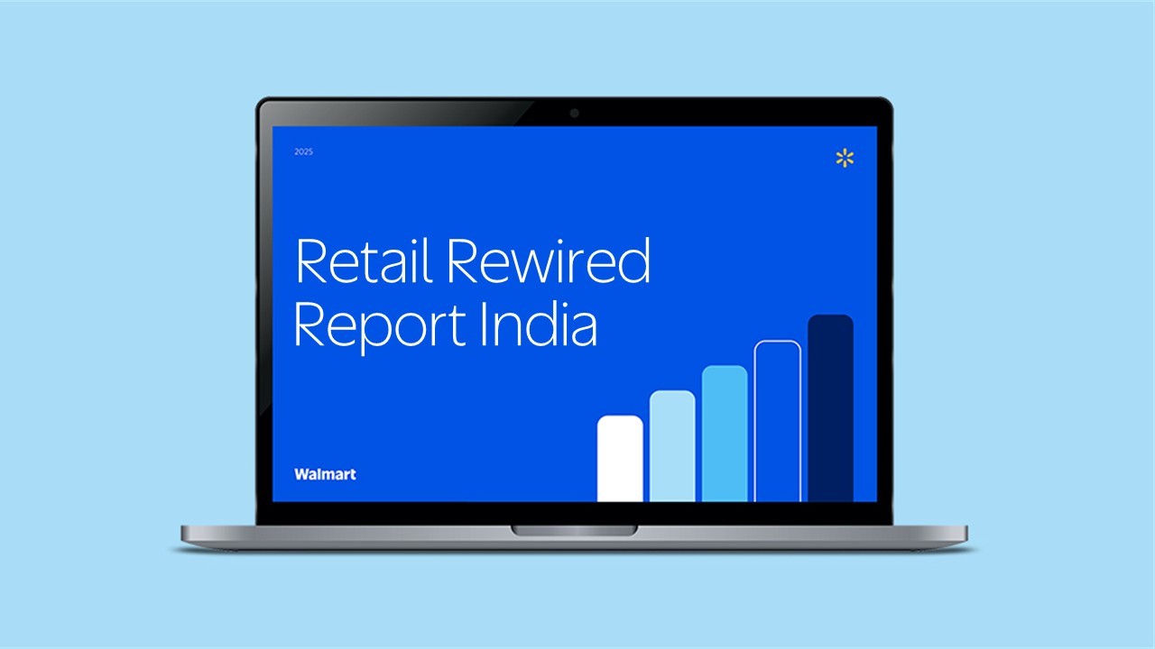 Laptop screen showing the "Retail Rewired Report India" with a 2025 label, Walmart logo, and a blue bar graph.