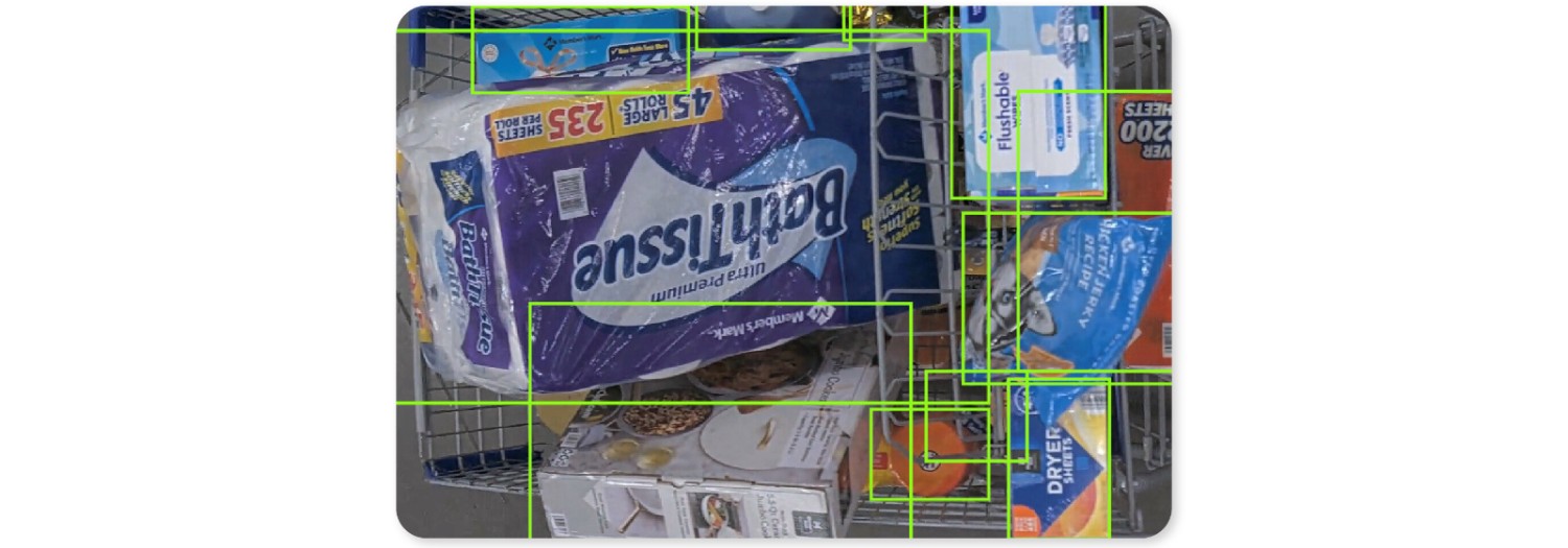 The image shows the top-view of items in a shopping cart being scanned by Sam’s Club’s exit technology.